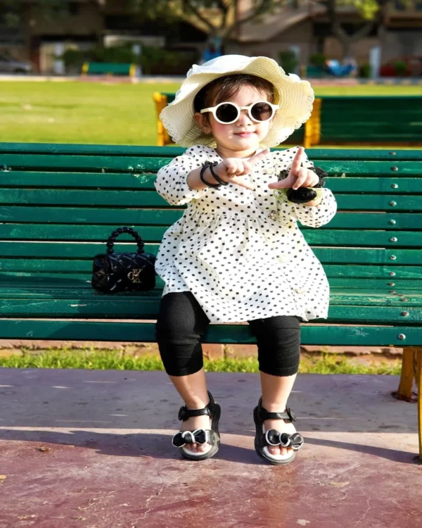 Chic Polka Dot Girl's Long Sleeve Top - Trendy Black and White Design for Stylish Kids